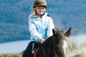Girl horse riding
