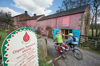 Cyclists at Little Salkeld Watermill photo courtesy of the Nurture Eden Photo Library