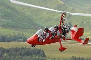 Gyrocopter flying photo courtesy of Lake District Gyroplanes