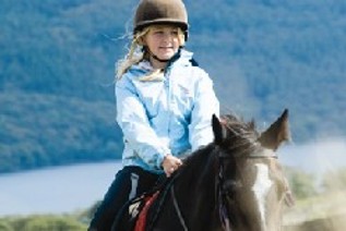 Girl horse riding