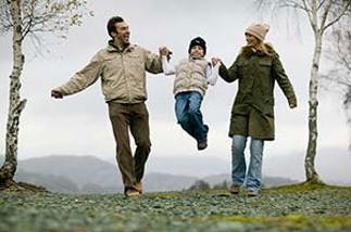 Family walking photo by Tony West courtesy of the Cumbria Photo Library