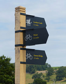 Cycling signpost at Lowther Castle