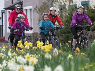 Cycling family photo by Tony West courtesy of the Nurture Eden Photo Library