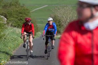 Cyclists at Great Asby photo by Tony West courteys of the Nurture Eden Photo Library
