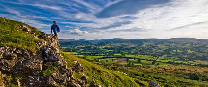 Walker overlooking the Lowther Valley photo courtesy of the Cumbria Photo Library
