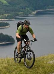 Cyclist at Ullswater photo by Dave Willis, courtesy of the Cumbria Photo Library