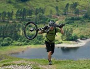 Cyclist on Helvellyn photo by Dave Willis courtesy fo the Cumbria Photo Library