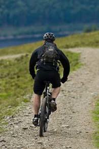 Cyclist at Ullswater photo by Dave Willis, courtesy of the Cumbria Photo Library