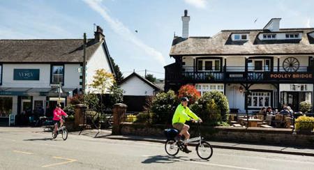 Cyclists at Pooley Bridge photo by Helen Shaw www.malkinphotography.co.uk
