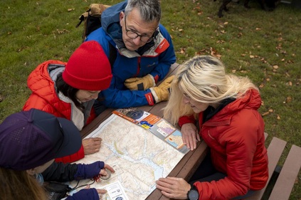 Group with a map photo courtesy of the Cumbria Photo Library