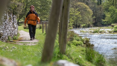 Walker by the River, photo courtesy of the Nurture Eden photo library