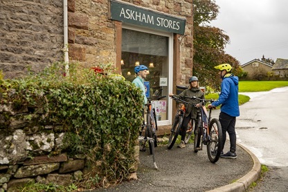 Cyclists in Askham photo courtesy of the Cumbria Photo library